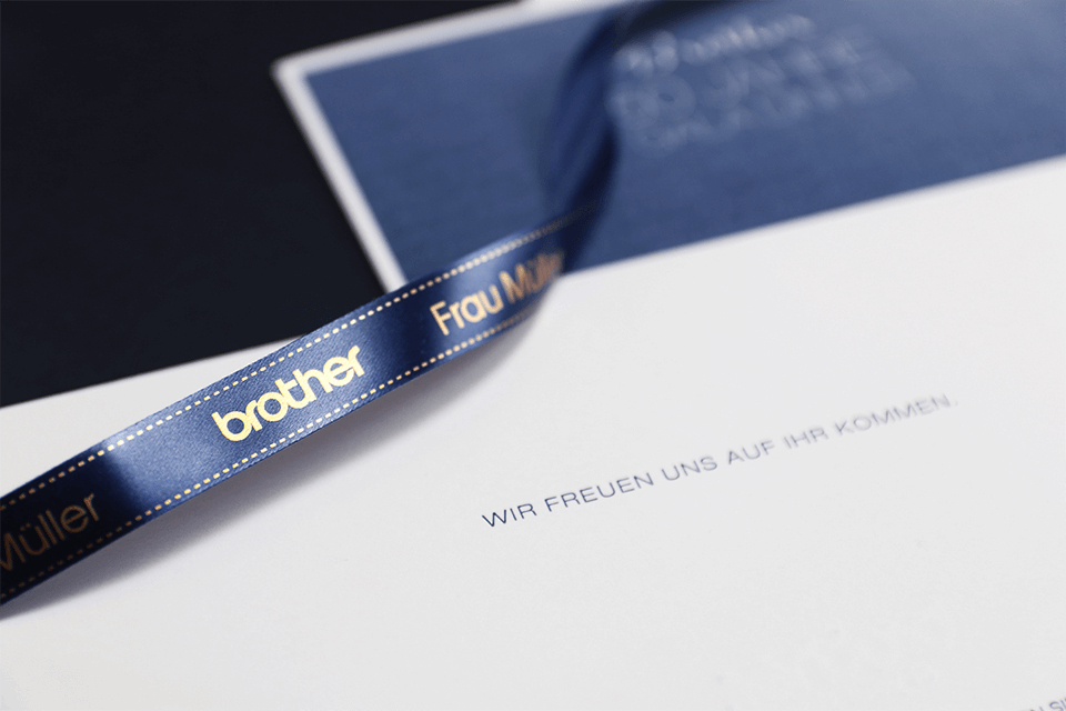 Tape Tze-rn34 12mm Ribbon Gold On Navy Blue
